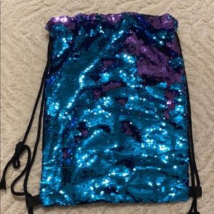 Sequened purple and blue backpack